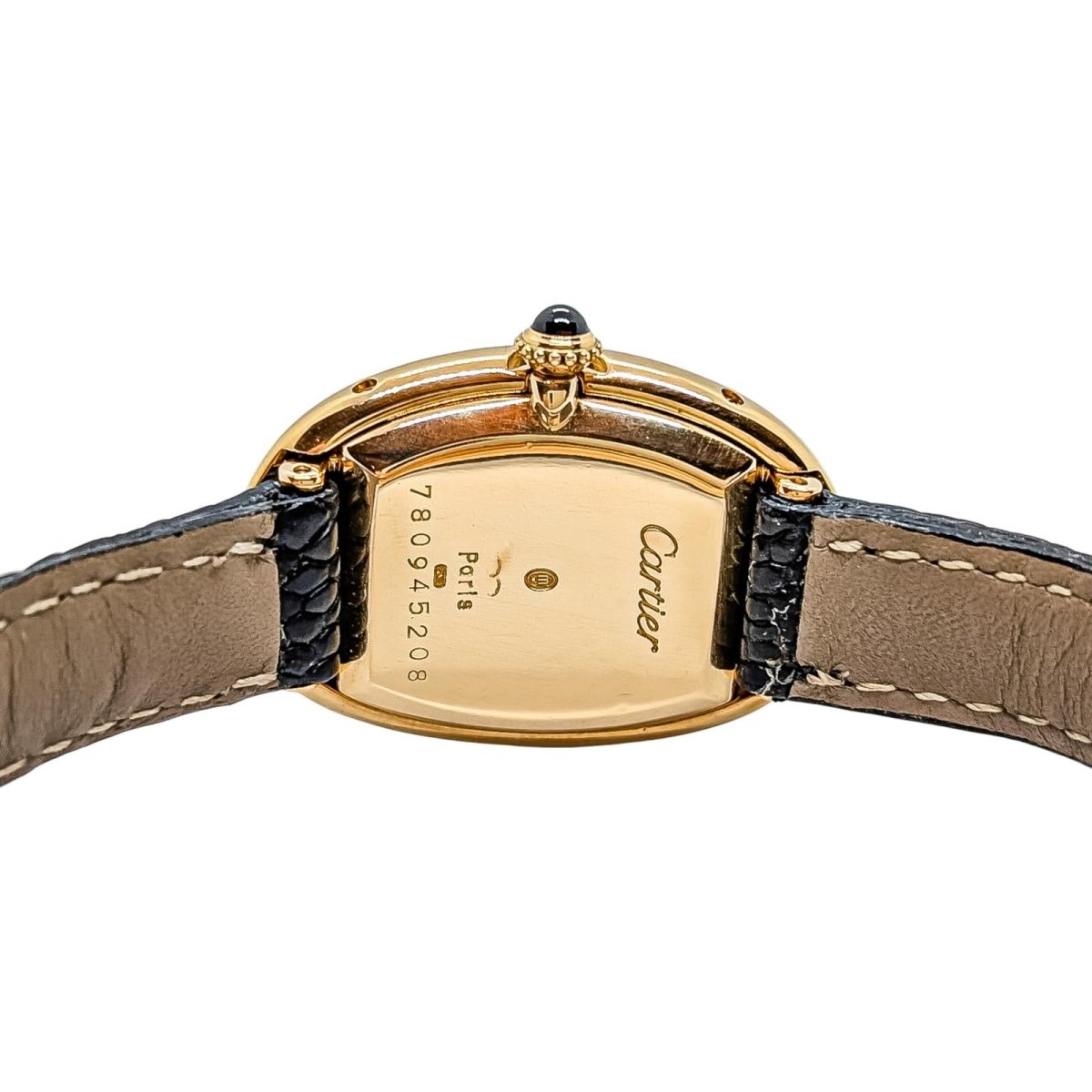 Montre Mécanique CARTIER "Baignoire" en or jaune, cuir et saphir - Castafiore