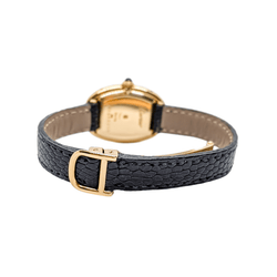 Montre Mécanique CARTIER "Baignoire" en or jaune, cuir et saphir - Castafiore