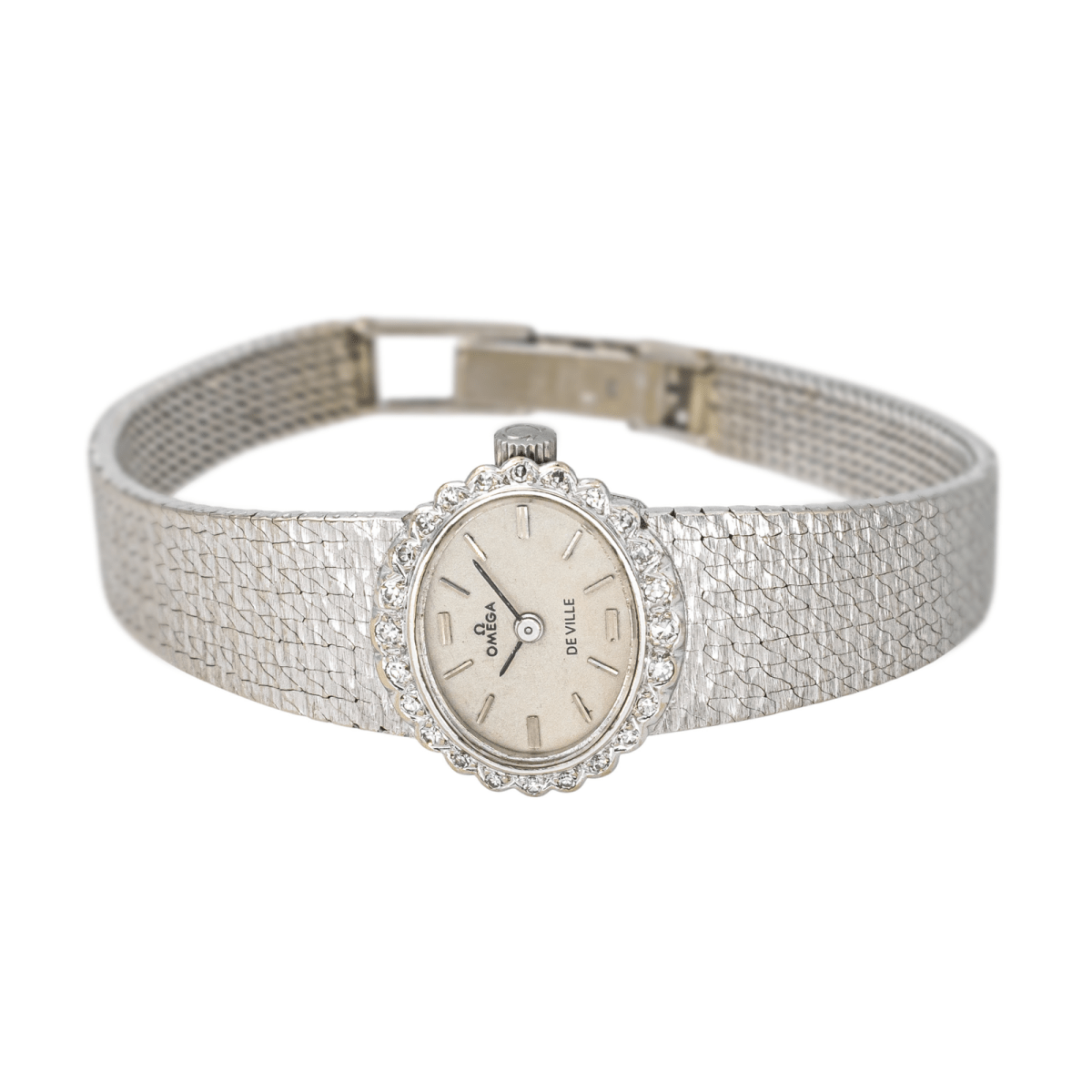 Montre OMEGA "De Ville" en or blanc, argent, saphir et diamant - Castafiore