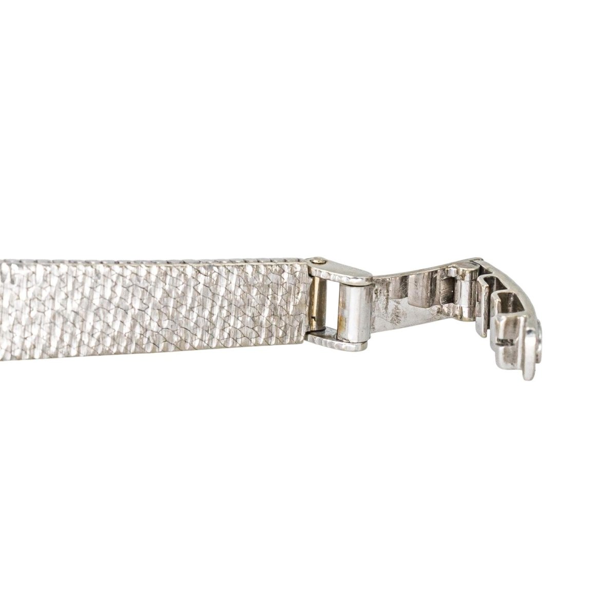 Montre OMEGA "De Ville" en or blanc, argent, saphir et diamant - Castafiore