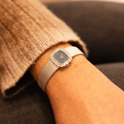 Montre OMEGA or blanc et diamants - Castafiore