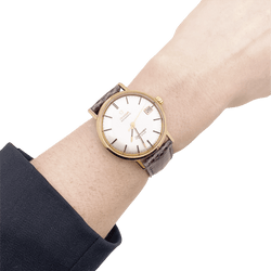 Montre OMEGA "Seamaster De Ville" en or rose, argent et cuir. - Castafiore
