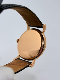 Montre OMÉGA "Vintage" en or rose, acier et cuir - Castafiore