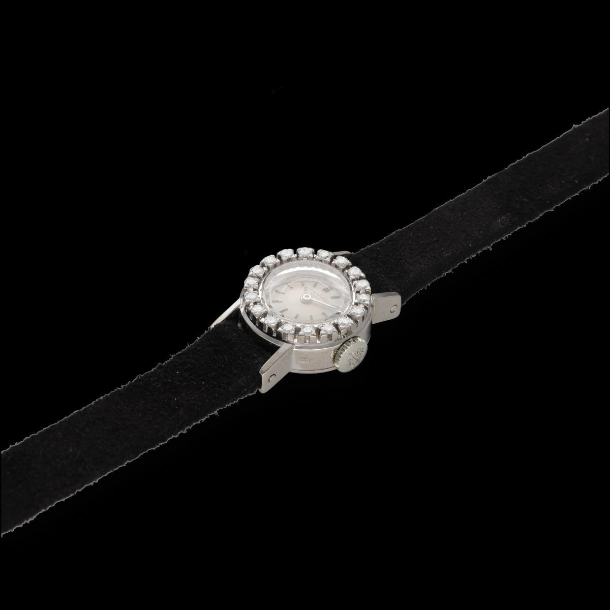 Montre PATEK PHILIPPE en or blanc et diamants - Castafiore