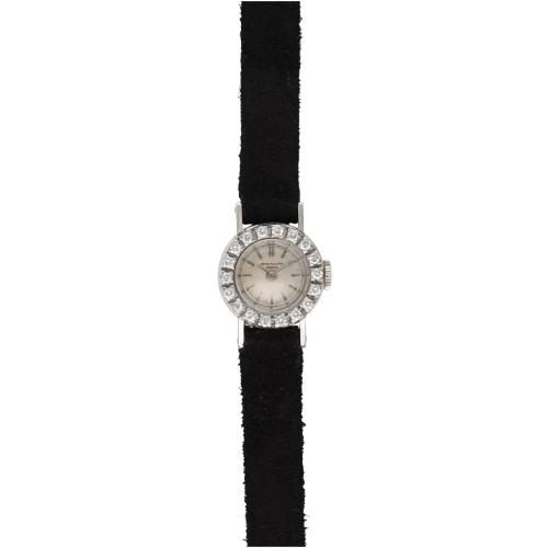 Montre PATEK PHILIPPE en or blanc et diamants - Castafiore