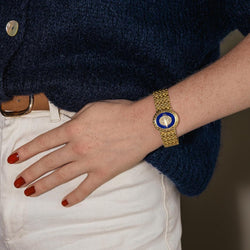 Montre PIAGET en or jaune, lapis - lazuli et diamants - Castafiore
