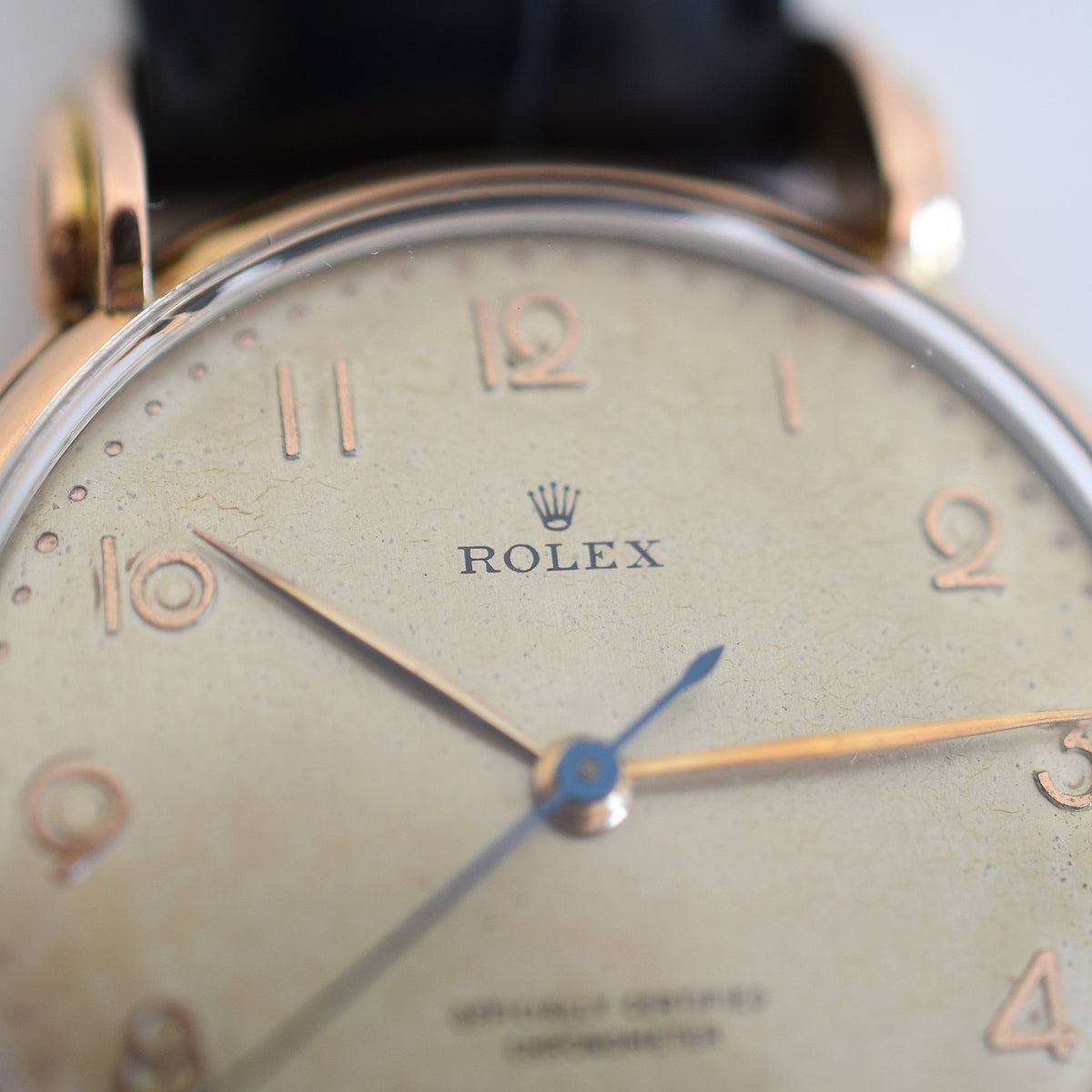 Montre ROLEX "Chronomètre" en or rose, acier et cuir - Castafiore