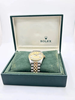 Montre ROLEX "DateJust" en or jaune et acier inoxydable - Castafiore