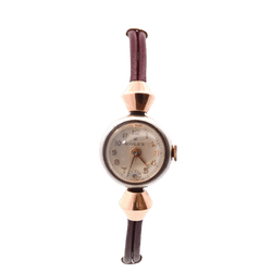 Montre ROLEX en or rose, acier et cuir - Castafiore