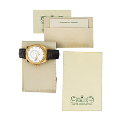 Montre ROLEX "Sky - Dweller" en or jaune, argent, cuir et saphir - Castafiore