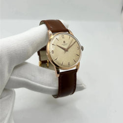 Montre UNIVERSAL GENÈVE plaqué or, acier et cuir - Castafiore