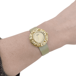 Montre VAN CLEEF & ARPELS "Tess" en or jaune, cuir et diamant - Castafiore