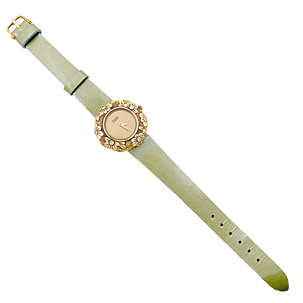 Montre VAN CLEEF & ARPELS "Tess" en or jaune, cuir et diamant - Castafiore