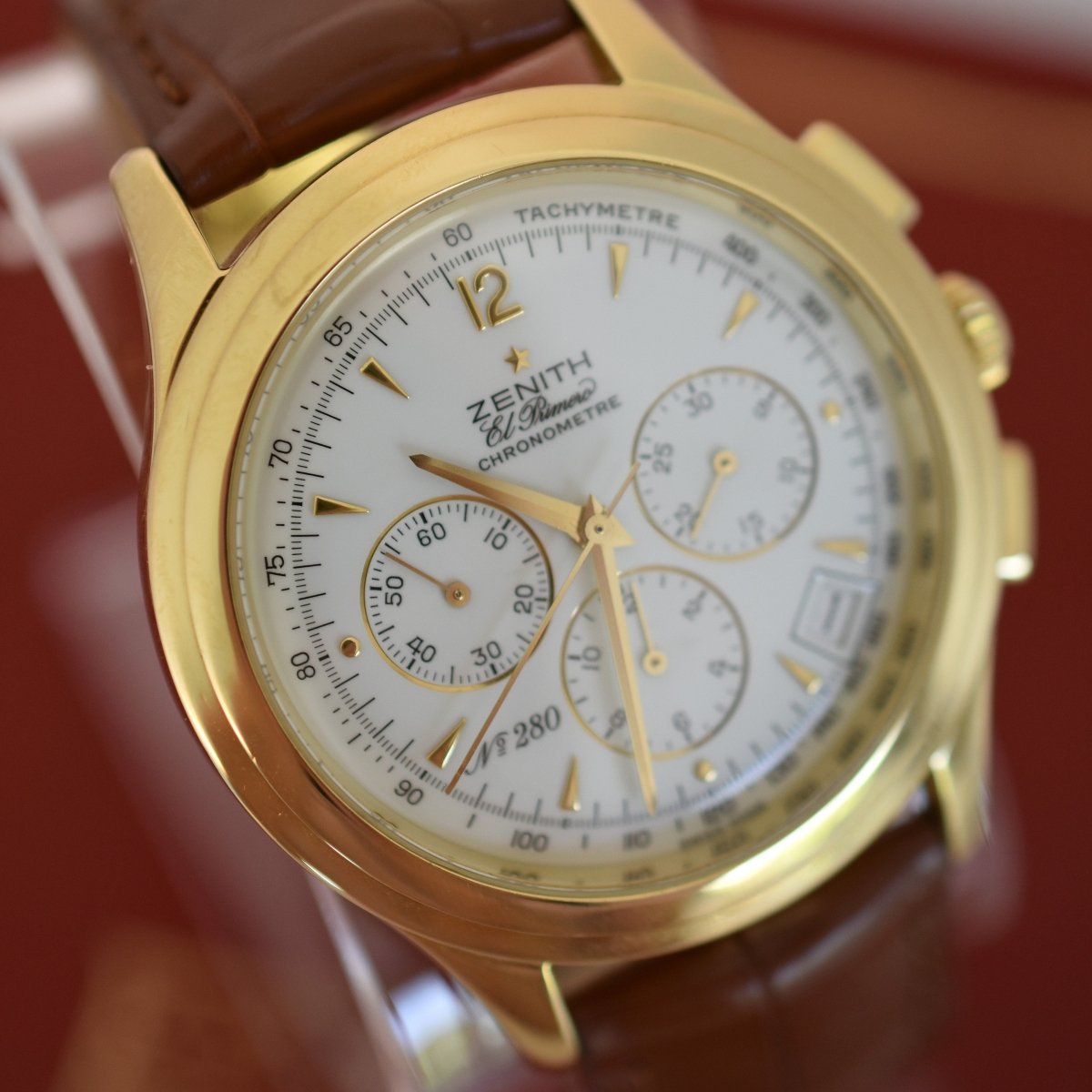 Montre ZENITH "El Primero" en or jaune et cuir - Castafiore