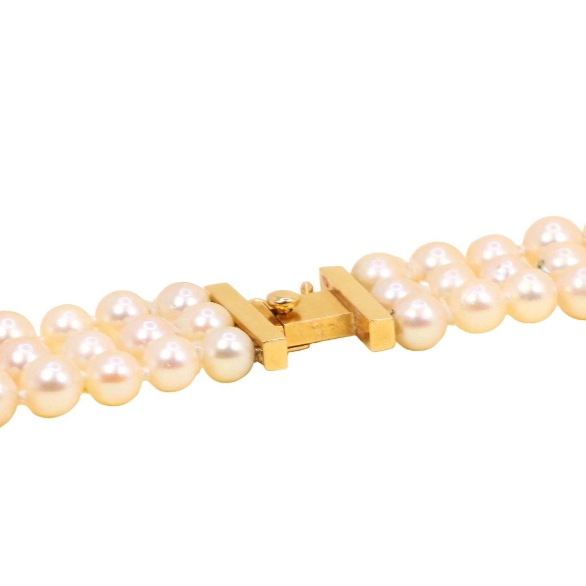 Parure REPOSSI en or jaune, perles, saphirs, émeraudes et diamants - Castafiore