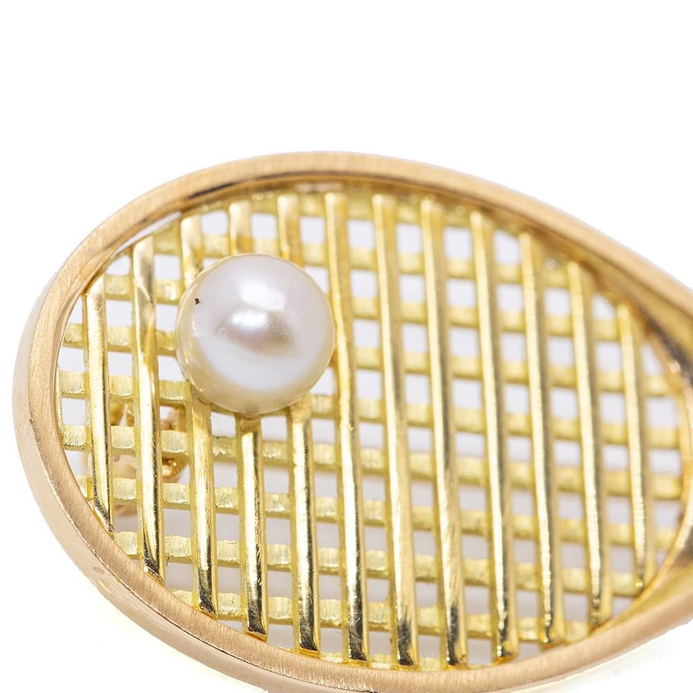 Pendentif à aiguille avec raquette de tennis - Castafiore