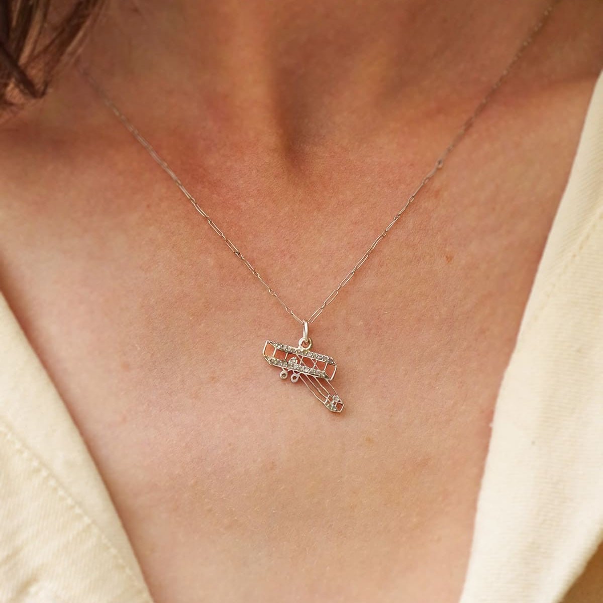 Pendentif CARTIER "Aéroplane" en platine et diamants - Castafiore