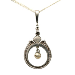 Pendentif en or blanc, onyx, perle et diamants - Castafiore