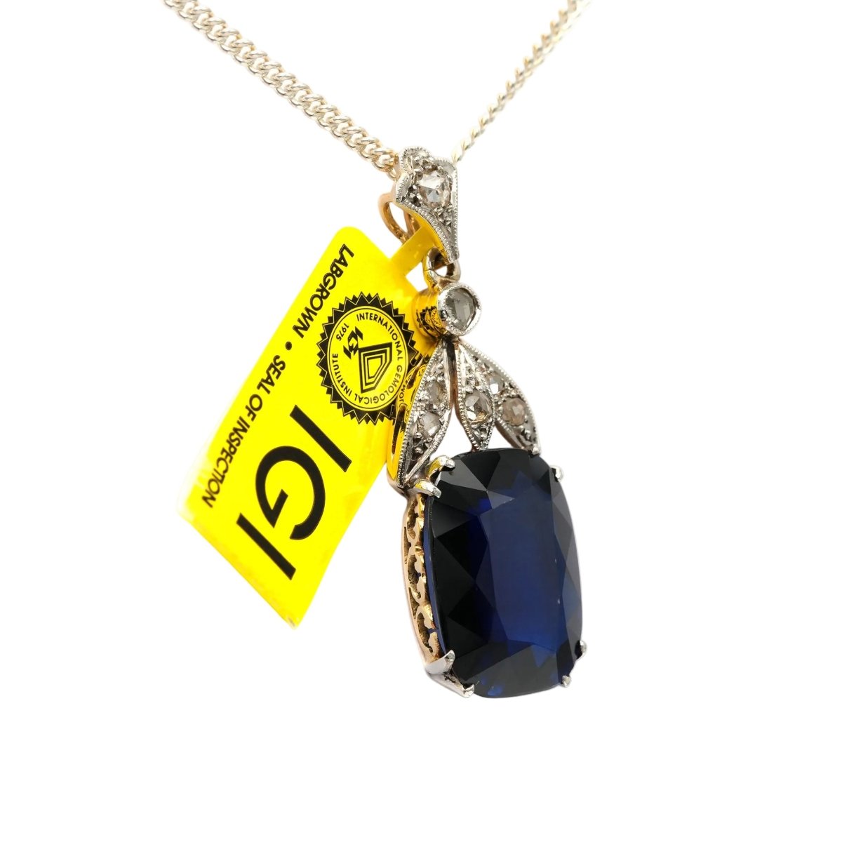 Pendentif en or blanc, or jaune, saphir et diamants - Castafiore