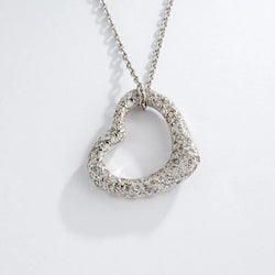 Pendentif en or gris formant un cœur pavée de diamants - Castafiore