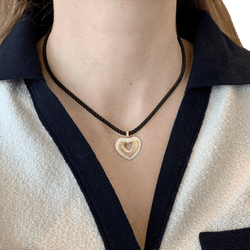 Pendentif POIRAY "Coeur Secret" en or blanc, or jaune et diamants - Castafiore