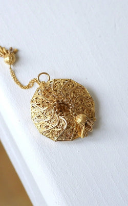 Pendentif porte - monnaie ancien en or jaune - Castafiore