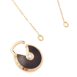 Sautoir Cartier Amulette PM en or rose et bois d'amourette - Castafiore