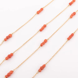 Sautoir en or jaune et boules de corail facettés - Castafiore
