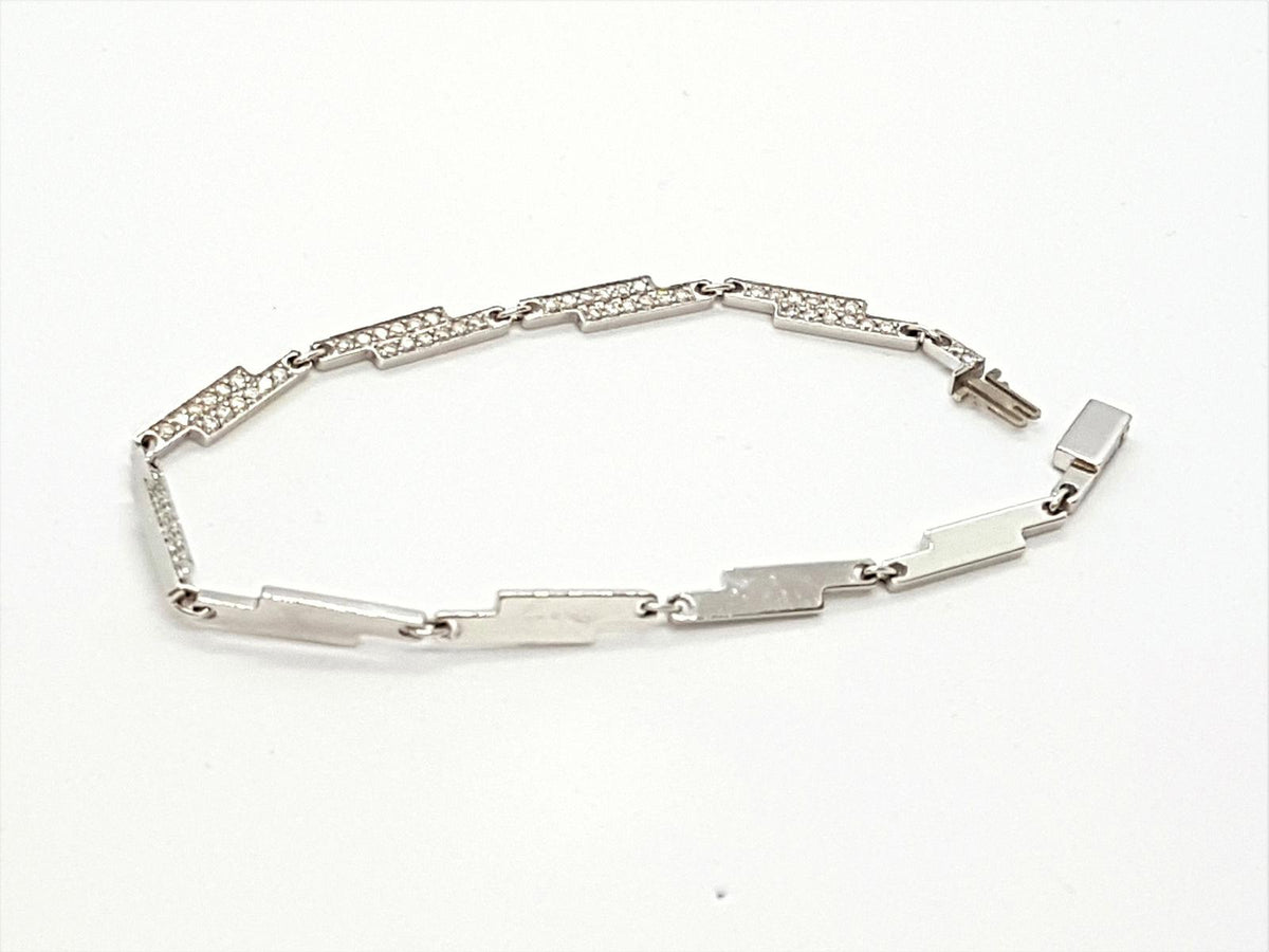 Bracelet DINH VAN "Seventies", en or blanc serti diamants