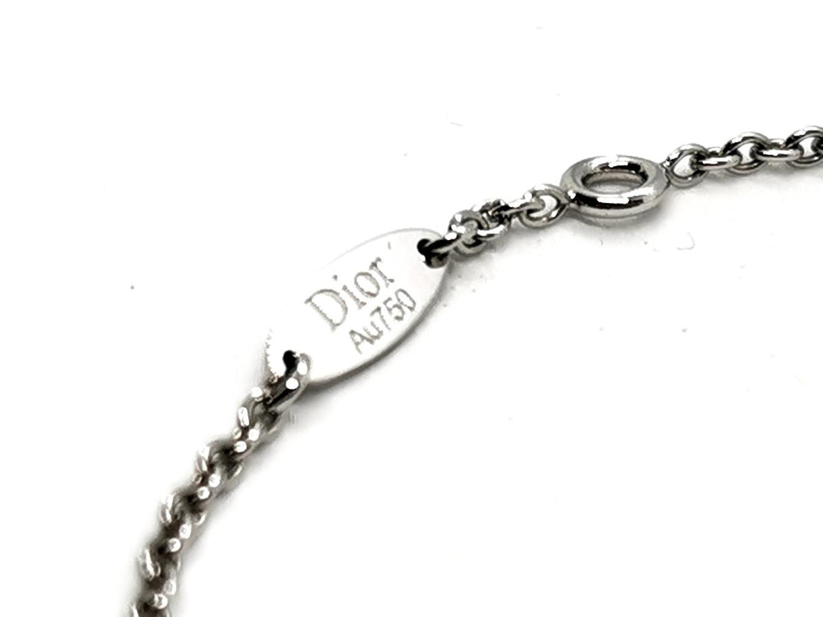 Bracelet DIOR "Rose des vents", or blanc, nacre et diamant