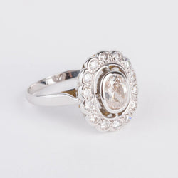 Bague marguerite en or gris et diamant - Castafiore