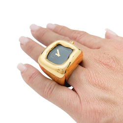 Bague montre Dior, modèle "Nougat", en or jaune et onyx - Castafiore