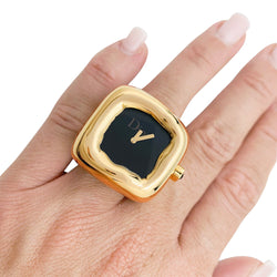 Bague montre Dior, modèle "Nougat", en or jaune et onyx - Castafiore