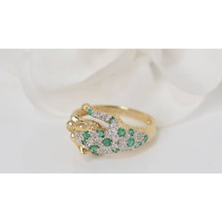 Bague panthère en or jaune, émeraudes et diamants - Castafiore