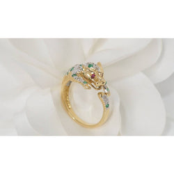 Bague panthère en or jaune, émeraudes et diamants - Castafiore