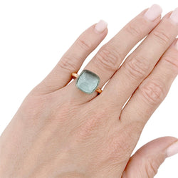 Bague Pomellato, "Nudo Maxi", deux ors et topaze bleue. - Castafiore