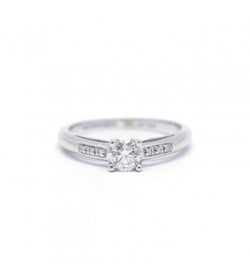 Bague Solitaire MAUBOUSSIN "Tu es le sel de ma vie", en or blanc et diamants - Castafiore