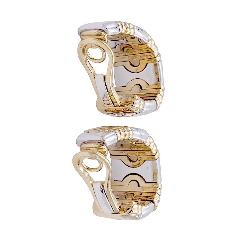 Boucles d'oreilles BULGARI "Parentesi" en or jaune et acier. - Castafiore