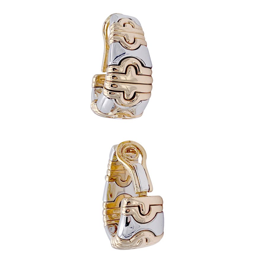 Boucles d'oreilles BULGARI "Parentesi" en or jaune et acier. - Castafiore