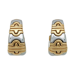 Boucles d'oreilles BULGARI "Parentesi" en or jaune et acier. - Castafiore