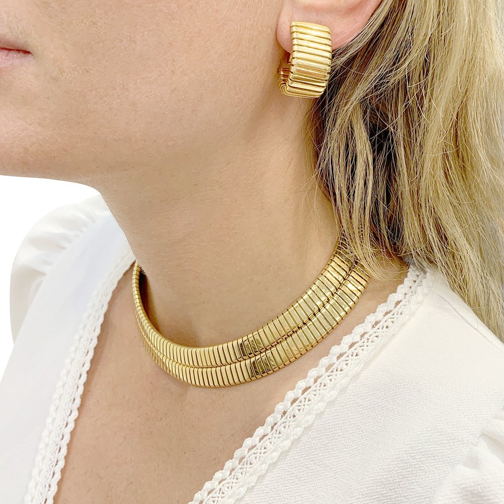 Boucles d'oreilles BULGARI, "Tubogas" en or jaune. - Castafiore
