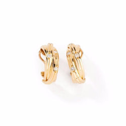 Boucles d'oreilles CARTIER, "collection trinity stars" en or jaune - Castafiore