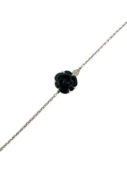 Bracelet CHANEL Camélia en or blanc, onyx et diamants - Castafiore