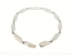 Bracelet DINH VAN "Seventies", en or blanc serti diamants - Castafiore