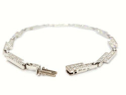 Bracelet DINH VAN "Seventies", en or blanc serti diamants - Castafiore
