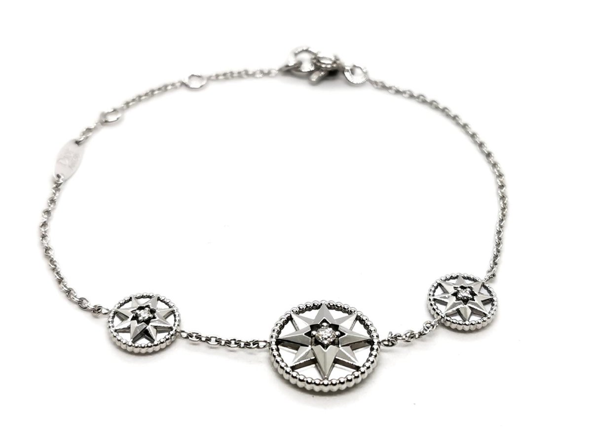 Bracelet DIOR "Rose des vents", or blanc, nacre et diamant - Castafiore