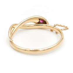 Bracelet Jonc serpent en 2 ors, rubis et diamants - Castafiore