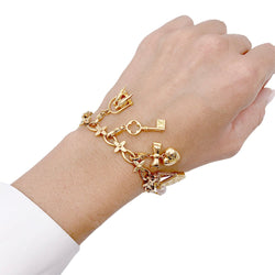 Bracelet Louis Vuitton, "Idylle", breloques, or jaune, or blanc, perles. - Castafiore
