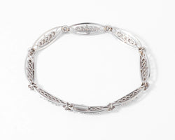 Bracelet or platine et et diamant formant des maillons ovales - Castafiore