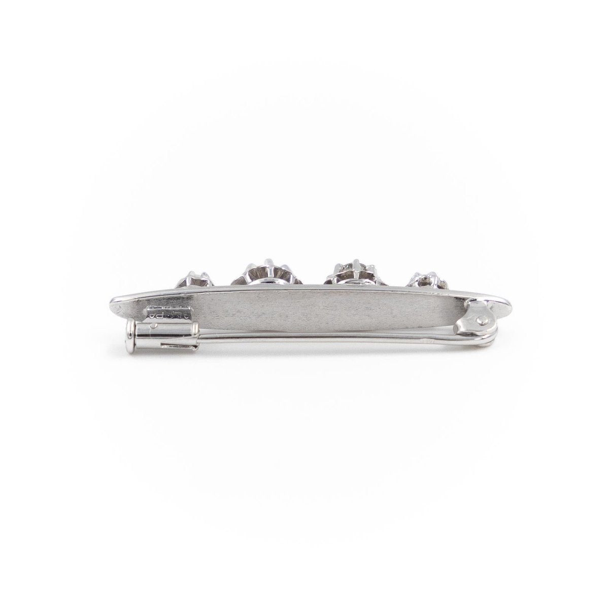 Broche Art déco en or blanc et diamants - Castafiore